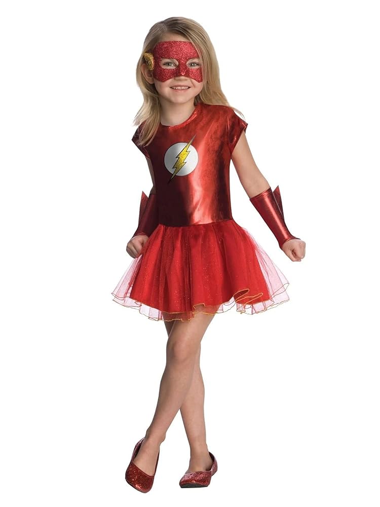 Child wearing a red superhero costume with a white logo on a white background