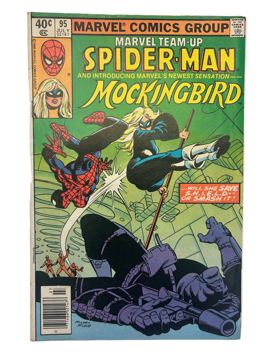 Comic book cover featuring Spider-Man and Mockingbird with Marvel Comics branding.