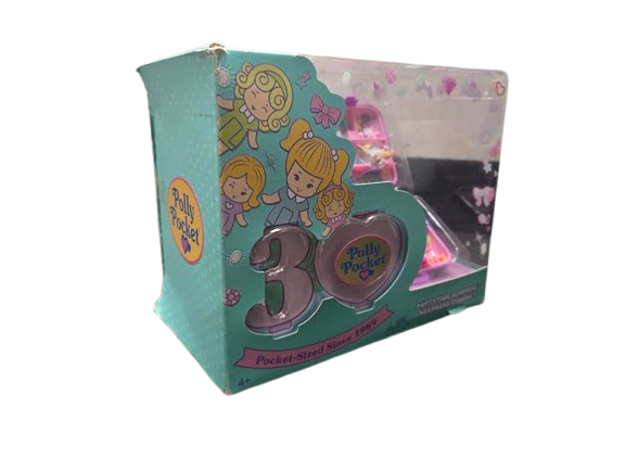 Polly Pocket toy in packaging with character illustration on a white background